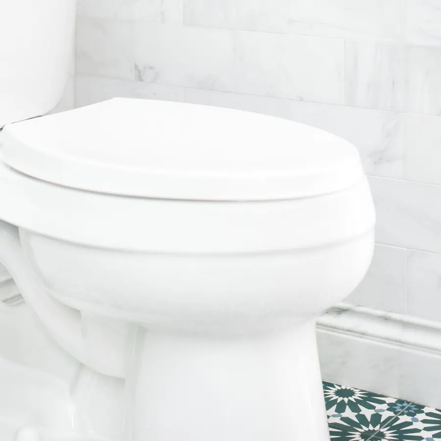 Bright bathroom fixture and tile detail