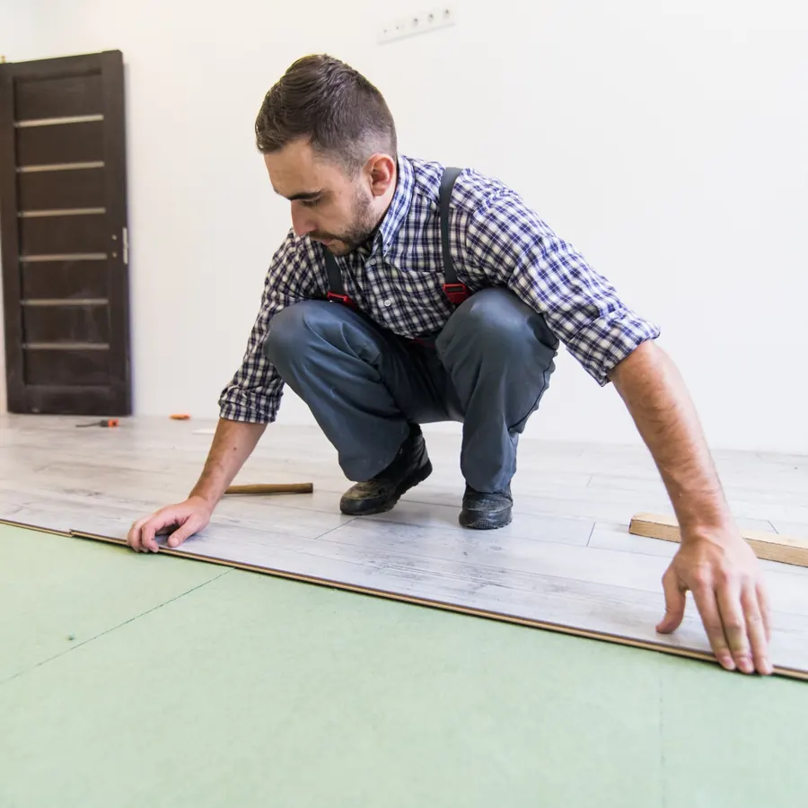 Flooring installation in progress during interior renovation